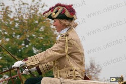 Una signora a cassetta della berlina di gala a 6 cavalli